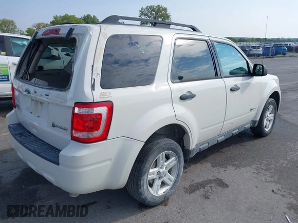 2010 Ford Escape Hybrid z VIN 1FMCU5K31AKD22069, wystawiony jako IAAI lot #40151027 z przebiegiem 185 932 mil mil oraz . Historia ofert i sprzedaży dostępna na DreamBid. Obrazek 4.