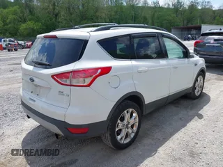2013 Ford Escape SE with VIN 1FMCU0G90DUB37052, listed as a IAAI auction lot 42132973 with 169,975 mi miles and . Bid and sale history available at DreamBid. Image 4.