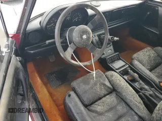 1990 Alfa Romeo Spider z VIN ZARBA12G6L6001683, wystawiony jako Copart lot #75611344 z przebiegiem 59 515 mil mil oraz Szkoda całkowita • Salvage title. Historia ofert i sprzedaży dostępna na DreamBid. Obrazek 8.