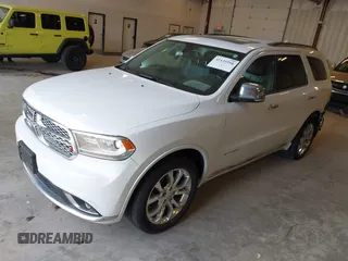 2016 Dodge Durango Citadel with VIN 1C4RDJEG9GC371805, listed as a IAAI auction lot 42135988 with 122,924 mi miles and . Bid and sale history available at DreamBid. Image 2.