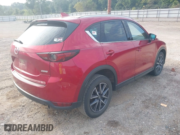 2017 Mazda CX-5 Grand Touring with VIN JM3KFADL8H0189033, listed as a IAAI auction lot 40029931 with 88,933 mi miles and . Bid and sale history available at carsss.com. Image 4.