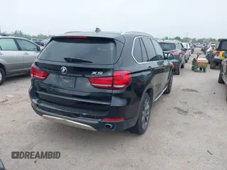 2014 BMW X5 xDrive35d with VIN 5UXKS4C56E0J93861, listed as a IAAI auction lot 41906775 with 149,263 mi miles. Bid and sale history available at carsss.com. Image 4.