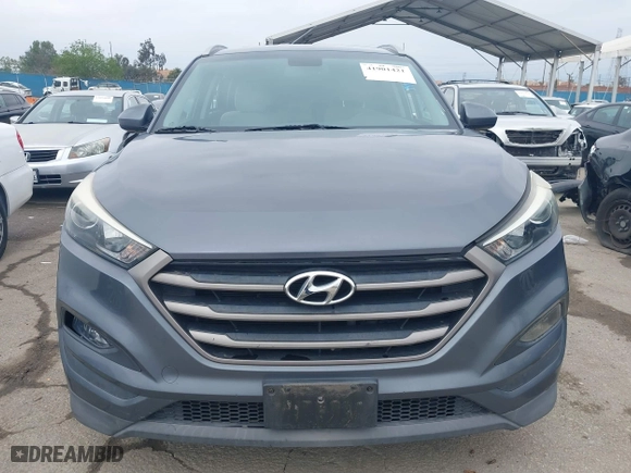 2016 Hyundai Tucson SE with VIN KM8J33A44GU176739, listed as a IAAI auction lot 41901421 with 85,377 mi miles. Bid and sale history available at carsss.com. Image 13.