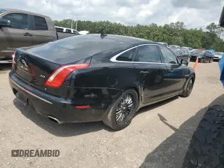 2015 Jaguar XJ with VIN SAJWA2GZXF8V88962, listed as a Copart auction lot 53919035 with 129,987 mi miles and Salvage Title. Bid and sale history available at carsss.com. Image 3.