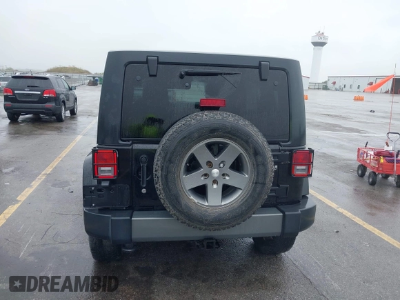 2013 Jeep Wrangler Unlimited Sport z VIN 1C4BJWDGXDL596450, wystawiony jako IAAI lot #42323862 z przebiegiem 114 105 mil mil oraz . Historia ofert i sprzedaży dostępna na DreamBid. Obrazek 17.