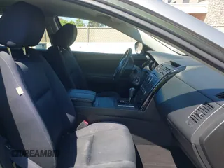 2011 Mazda CX-9 Sport with VIN JM3TB2BVXB0307360, listed as a IAAI auction lot 42580629 with 136,928 mi miles and . Bid and sale history available at DreamBid. Image 5.