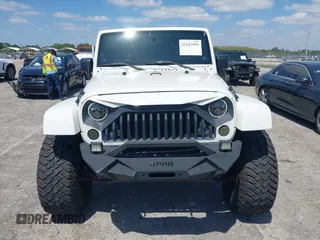 2010 Jeep Wrangler z VIN 1J4HB5H16AL186600, wystawiony jako IAAI lot #42147992 z przebiegiem 134 717 mil mil oraz . Historia ofert i sprzedaży dostępna na DreamBid. Obrazek 12.