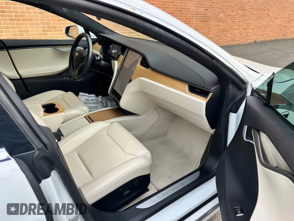2019 Tesla Model S 75D with VIN 5YJSA1E28KF333962, listed as a Copart auction lot 54815975 with 21,203 mi miles and Salvage title. Bid and sale history available at DreamBid. Image 6.
