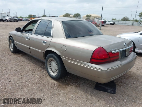 2004 Mercury Grand Marquis GS with VIN 2MEFM74W94X671873, listed as a IAAI auction lot 42130841 with 92,757 mi miles and . Bid and sale history available at DreamBid. Image 3.
