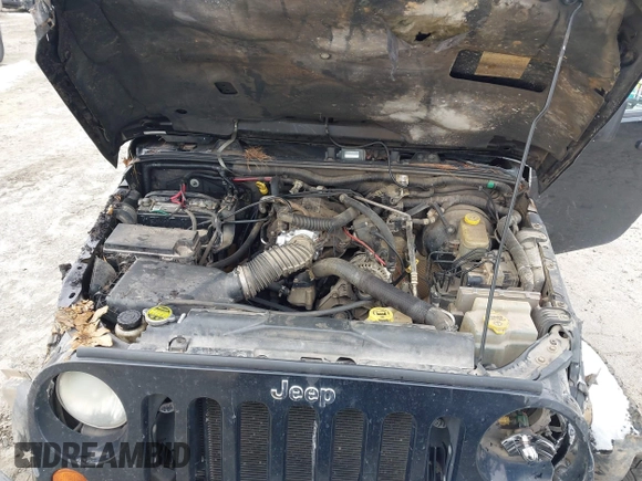 2007 Jeep Wrangler Sahara z VIN 1J8FA54107L202622, wystawiony jako IAAI lot #41391138 z przebiegiem 251 388 mil mil oraz . Historia ofert i sprzedaży dostępna na DreamBid. Obrazek 10.