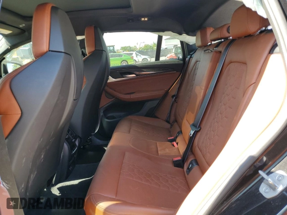 2022 BMW X4 M z VIN 5YM23EC02N9K93385, wystawiony jako Copart lot #53954854 z przebiegiem 17 189 mil mil oraz . Historia ofert i sprzedaży dostępna na DreamBid. Obrazek 11.