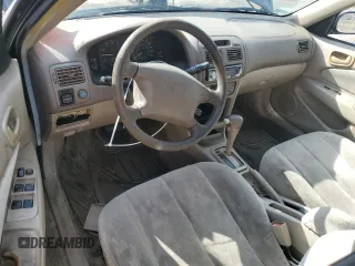 1999 Toyota Corolla VE с VIN 2T1BR18E7XC225469, выставлен на аукционе Copart как лот 59929415 с пробегом 222 746 миль миль и Списание • Salvage title. История ставок и продаж доступна на DreamBid. Изображение 8.