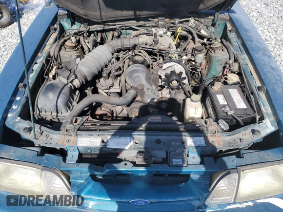 1993 Ford Mustang z VIN 1FACP44MXPF128112, wystawiony jako Copart lot #54756785 z przebiegiem 92 587 mil mil oraz Czysty tytuł • Clean title. Historia ofert i sprzedaży dostępna na DreamBid. Obrazek 11.