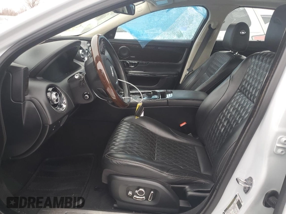 2016 Jaguar XJ Portfolio with VIN SAJWJ2GD2G8V92848, listed as a Copart auction lot 41614745 with 36,650 mi miles and Salvage title. Bid and sale history available at DreamBid. Image 7.