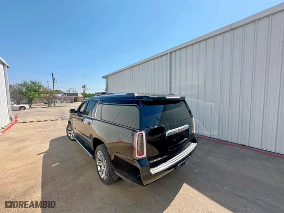 2015 GMC Yukon XL Denali with VIN 1GKS2JKJ5FR282675, listed as a Copart auction lot 52463365 with 221,109 mi miles and Clean Title. Bid and sale history available at carsss.com. Image 3.