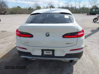 2021 BMW X4 xDrive30i with VIN 5UX2V1C03M9F12611, listed as a IAAI auction lot 42145740 with 60,417 mi miles and . Bid and sale history available at DreamBid. Image 16.