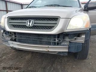 2004 Honda Pilot LX with VIN 2HKYF18144H501874, listed as a IAAI auction lot 41717956 with 290,828 mi miles. Bid and sale history available at carsss.com. Image 6.