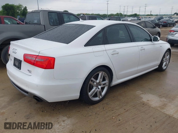 2014 Audi A6 Prestige with VIN WAUHGAFC6EN154497, listed as a IAAI auction lot 42189308 with 97,472 mi miles and . Bid and sale history available at DreamBid. Image 4.