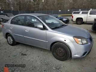 2010 Kia Rio LX with VIN KNADH4A38A6627955, listed as a Copart auction lot 43702265 with 138,005 mi miles and Non Repairable. Bid and sale history available at carsss.com. Image 4.