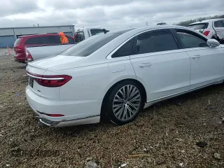 2019 Audi A8 z VIN WAU8DAF87KN018640, wystawiony jako Copart lot #54318975 z przebiegiem Nie podano mil oraz Szkoda całkowita • Salvage title. Historia ofert i sprzedaży dostępna na DreamBid. Obrazek 13.