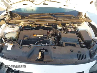 2019 Honda Civic LX with VIN 19XFC2F61KE014007, listed as a IAAI auction lot 41795070 with 64,259 mi miles and . Bid and sale history available at DreamBid. Image 10.