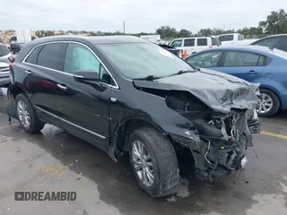 2021 Cadillac XT5 FWD Premium Luxury with VIN 1GYKNCRS3MZ103893, listed as a IAAI auction lot 41286761 with 75,728 mi miles. Bid and sale history available at carsss.com. Image 1.