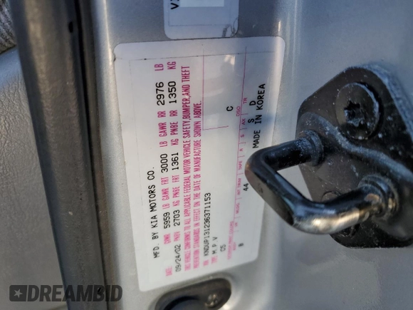 2003 Kia Sedona LX with VIN KNDUP131236371153, listed as a Copart auction lot 80989974 with 205,181 mi miles and Salvage Title. Bid and sale history available at carsss.com. Image 14.