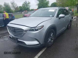 2020 Mazda CX-9 Touring with VIN JM3TCBCY8L0400787, listed as a IAAI auction lot 42188981 with 86,459 mi miles and . Bid and sale history available at DreamBid. Image 2.