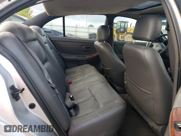 2000 Oldsmobile Intrigue GLS z VIN 1G3WX52H0YF233648, wystawiony jako Copart lot #72619824 z przebiegiem Nie podano mil oraz Nie do naprawy. Historia ofert i sprzedaży dostępna na DreamBid. Obrazek 11.