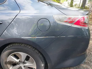 2014 Kia Optima LX with VIN KNAGM4AD0E5064445, listed as a IAAI auction lot 42204163 with 115,976 mi miles and . Bid and sale history available at DreamBid. Image 13.