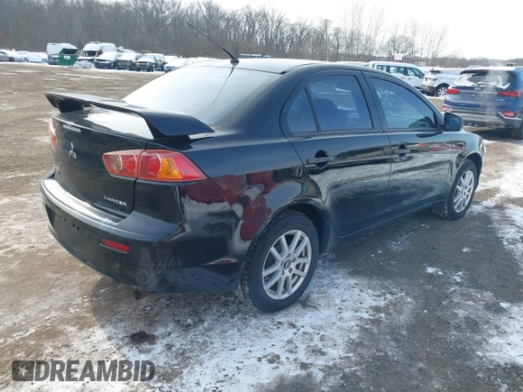 2009 Mitsubishi Lancer DE with VIN JA3AU16U39U000541, listed as a IAAI auction lot 41388897 with 226,951 mi miles. Bid and sale history available at carsss.com. Image 4.