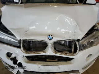 2014 BMW X5 sDrive35i with VIN 5UXKR2C5XE0C00653, listed as a Copart auction lot 48744455 with 111,812 mi miles and Salvage Title. Bid and sale history available at carsss.com. Image 12.