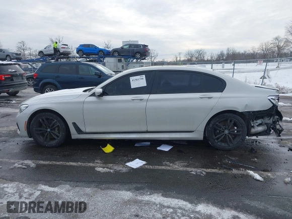 2018 BMW 7 Series 740i xDrive with VIN WBA7E4C59JGV23876, listed as a IAAI auction lot 41381398 with 106,675 mi miles. Bid and sale history available at carsss.com. Image 14.