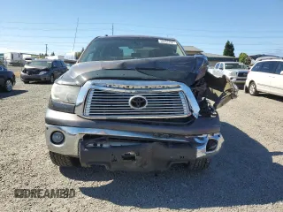 2012 Toyota Tundra 4WD Truck LTD with VIN 5TFHY5F15CX256557, listed as a Copart auction lot 58452704 with 128,640 mi miles and Salvage Title. Bid and sale history available at carsss.com. Image 5.