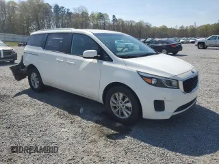 2017 Kia Sedona LX with VIN KNDMB5C14H6237144, listed as a Copart auction lot 51140465 with 128,356 mi miles and Salvage Title. Bid and sale history available at carsss.com. Image 4.