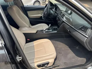 2014 BMW 3 Series 328d xDrive with VIN WBA3D5C52EKX99262, listed as a Copart auction lot 65983355 with 292,446 mi miles and Clean title. Bid and sale history available at DreamBid. Image 5.