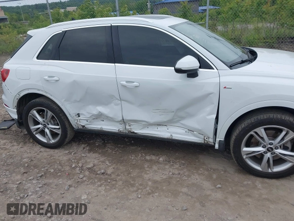 2022 Audi Q3 S line Premium Plus with VIN WA1EECF38N1031860, listed as a IAAI auction lot 42345075 with 27,171 mi miles and . Bid and sale history available at DreamBid. Image 6.
