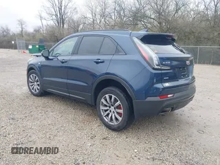 2021 Cadillac XT4 AWD Sport with VIN 1GYFZFR45MF053573, listed as a IAAI auction lot 41909784 with 36,309 mi miles and . Bid and sale history available at DreamBid. Image 3.