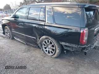 2016 GMC Yukon Denali with VIN 1GKS2CKJ2GR412201, listed as a IAAI auction lot 41185716 with 124,421 mi miles. Bid and sale history available at carsss.com. Image 3.