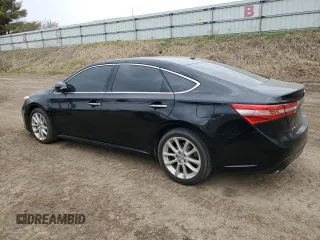 2013 Toyota Avalon XLE with VIN 4T1BK1EB4DU059369, listed as a Copart auction lot 53482475 with 134,577 mi miles and Salvage Title. Bid and sale history available at DreamBid. Image 2.