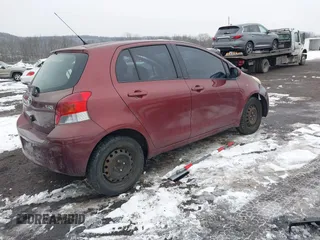 2010 Toyota Yaris with VIN JTDKT4K34A5291847, listed as a IAAI auction lot 41562243 with 182,067 mi miles. Bid and sale history available at carsss.com. Image 4.