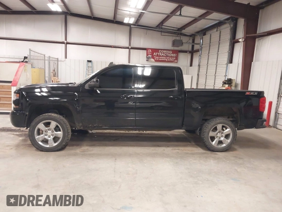 2017 Chevrolet Silverado 1500 LT with VIN 3GCUKREC6HG501307, listed as a IAAI auction lot 41611899 with 133,863 mi miles and . Bid and sale history available at DreamBid. Image 15.