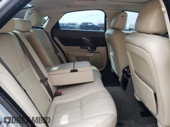 2013 Jaguar XJ with VIN SAJWA1C77D8V41738, listed as a Copart auction lot 53796225 with 104,063 mi miles and Salvage Title. Bid and sale history available at DreamBid. Image 10.