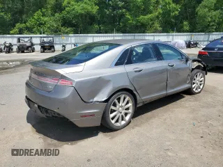 2016 Lincoln MKZ z VIN 3LN6L2J96GR601039, wystawiony jako Copart lot #63209425 z przebiegiem 151 629 mil mil oraz Szkoda całkowita • Salvage title. Historia ofert i sprzedaży dostępna na DreamBid. Obrazek 3.