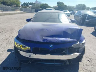 2020 BMW M4 with VIN WBS4Y9C09LFJ02627, listed as a IAAI auction lot 41785396 with 27,424 mi miles. Bid and sale history available at carsss.com. Image 12.