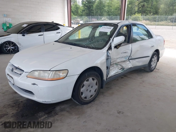1998 Honda Accord LX with VIN 1HGCG5640WA004358, listed as a IAAI auction lot 42643808 with Not provided miles and . Bid and sale history available at DreamBid. Image 2.