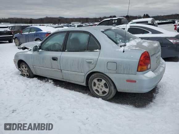 2005 Hyundai Accent GLS with VIN KMHCG45C05U605523, listed as a Copart auction lot 43811815 with 190,638 mi miles and Salvage Title. Bid and sale history available at carsss.com. Image 2.