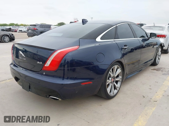 2018 Jaguar XJ R-Sport with VIN SAJWA1C74J8W14026, listed as a IAAI auction lot 42032719 with 95,263 mi miles and . Bid and sale history available at DreamBid. Image 4.