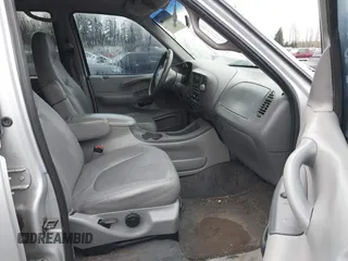 1999 Ford Expedition XLT z VIN 1FMPU18L7XLA72471, wystawiony jako IAAI lot #41604688 z przebiegiem 288 349 mil mil oraz . Historia ofert i sprzedaży dostępna na DreamBid. Obrazek 5.