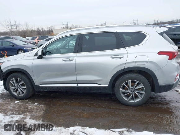 2019 Hyundai Santa Fe Ultimate with VIN 5NMS5CAD1KH000394, listed as a IAAI auction lot 41455421 with 42,886 mi miles and . Bid and sale history available at DreamBid. Image 14.